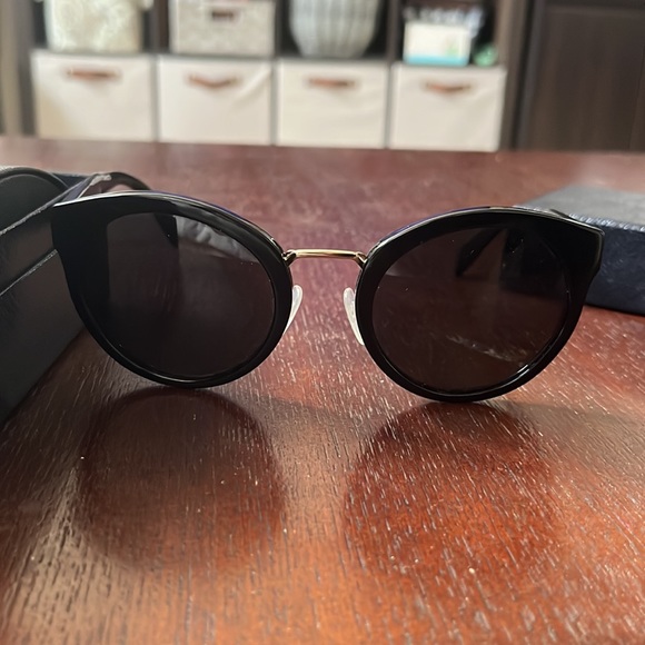 Prada Sunglasses in Black and gold hardware - Picture 5 of 5